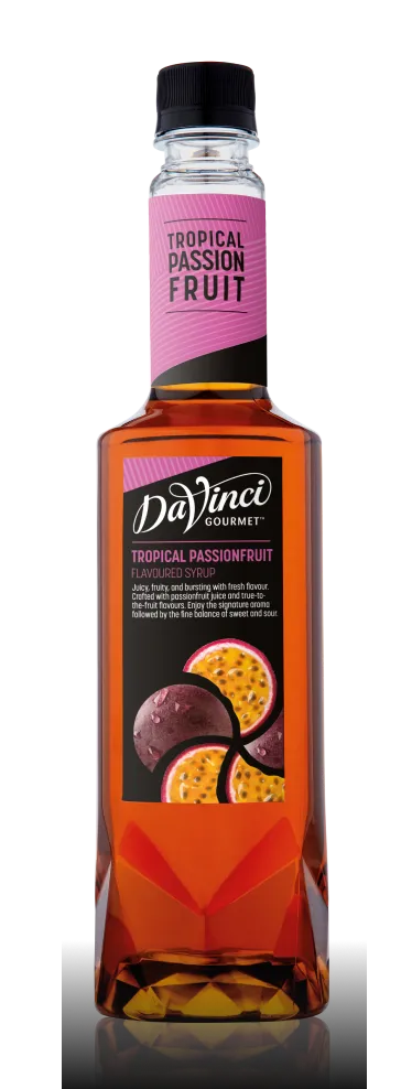 DaVinci Gourmet Tropical Passionfruit flavored syrup bottle with pink label and orange liquid inside (tropical fruit flavor)